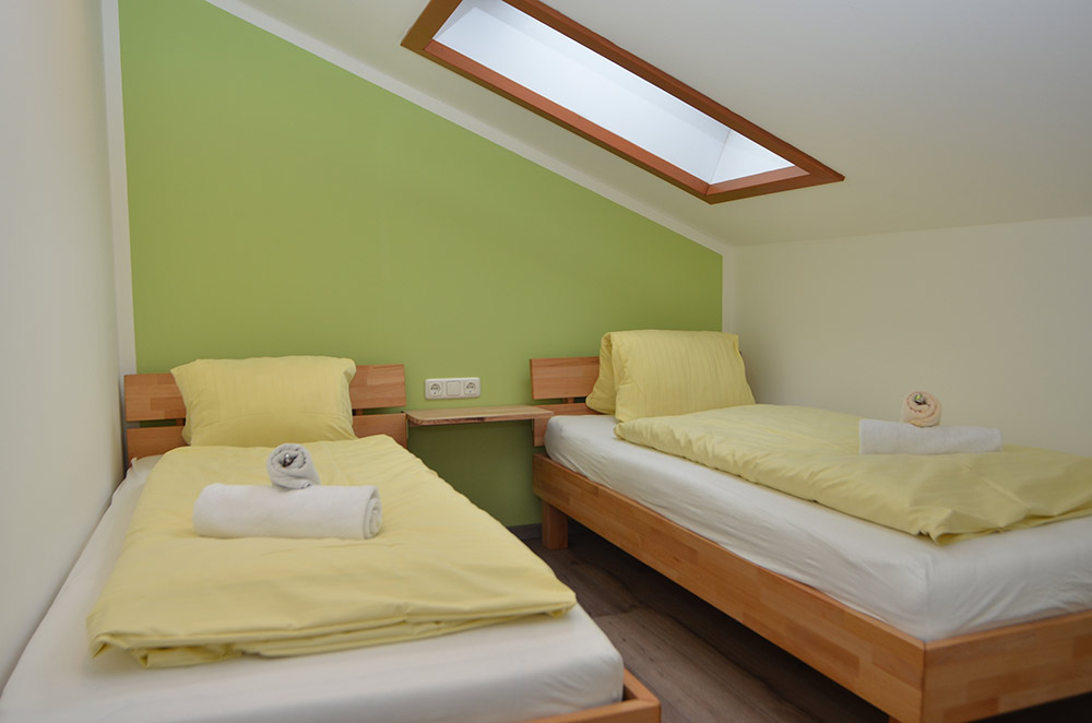 second bedroom with 2 single beds